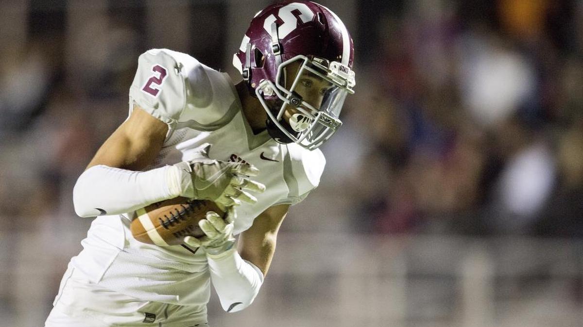 State College’s Noah Woods caught three touchdown passes Saturday to help the Little Lions to a 35-14 win over McDowell to clinch a spot in the state playoffs.