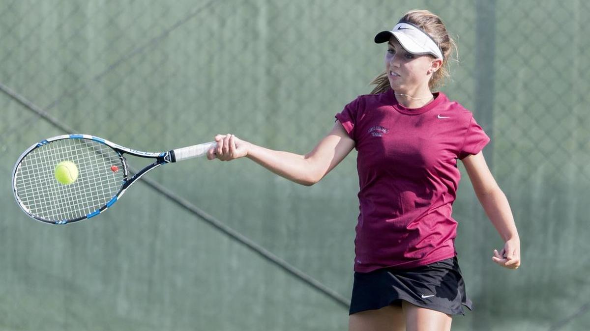 State College's Kelly Vanden returns the ball during Thursday’s match. Vanden, who is the No. 1 singles player, went 3-0 this week.