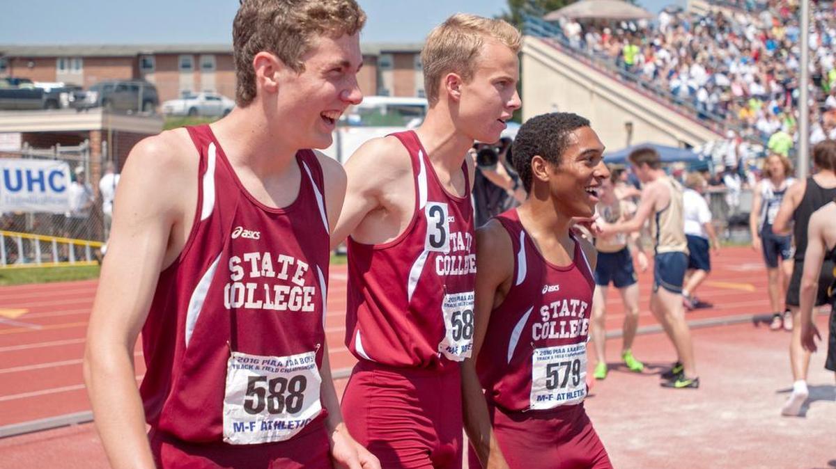 State College's Owen Wing, Alex Milligan and Nick Feffer celebrate their win in the 4x800 meter relay during the PIAA State Track and Field and Championships at Shippensburg University on Saturday, May 28, 2016. State College won with a time of 7:35.25.