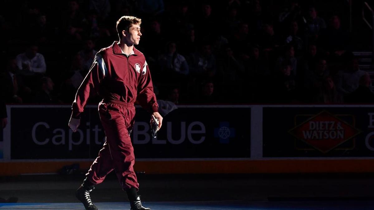 State College's Cole Urbas is announced during the parade of champions for the 195-pound championship bout at the PIAA Wrestling Championships.