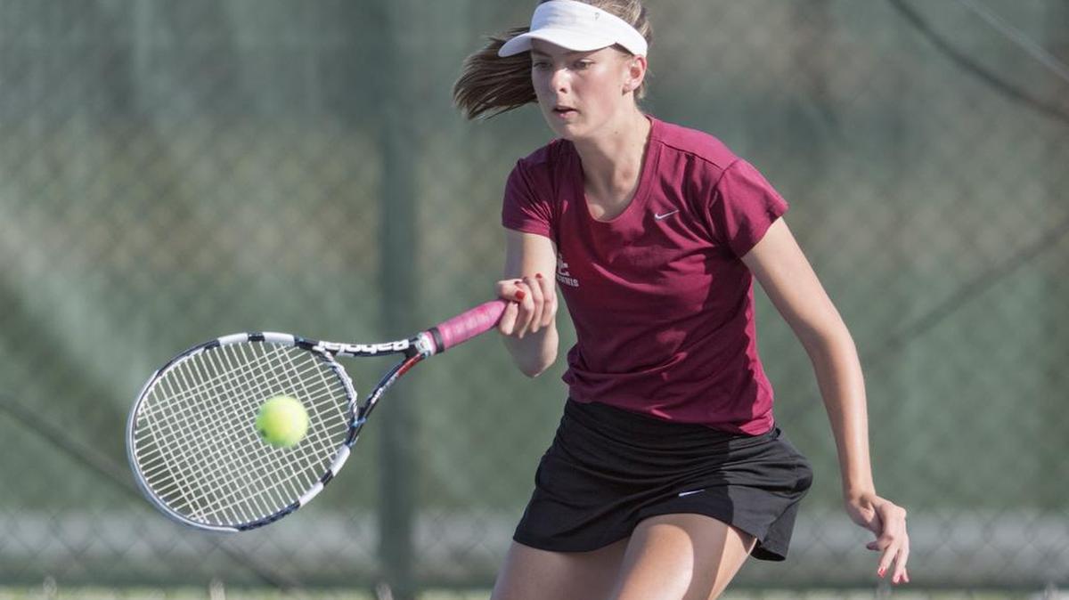No. 2 singles player, State College’s Catelyn Janac, returns the ball during the match on Thursday.