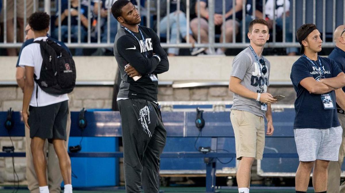 Harrisburg DE/RB Micah Parsons watches the Penn State football team warm up before the game against Georgia State on Sept. 16. Parsons rushed for more than 200 yards against State College on Friday.