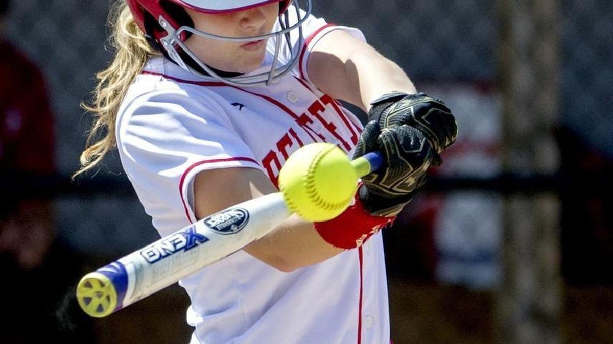 Bellefonte’s Rianna Trexler hits a single over Yough’s second baseman during the PIAA softball playoffs on Thursday at Mount Aloysius College. Yough won 13-3 in six innings.