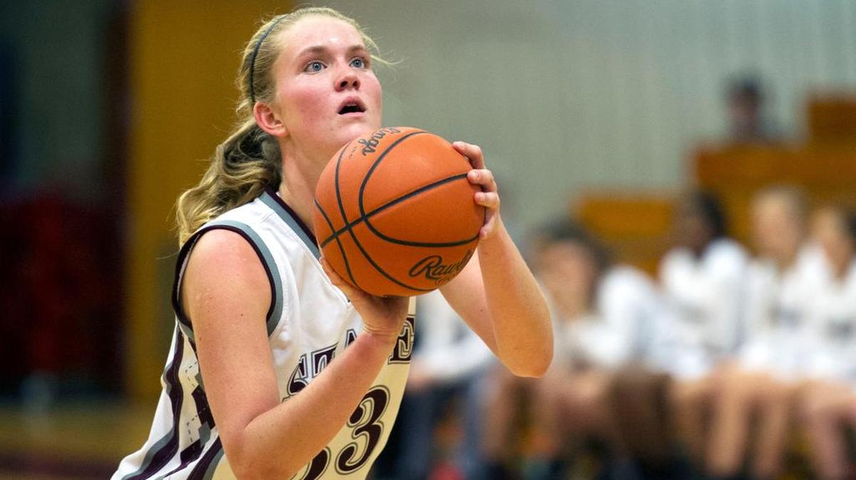 State College’s Taylor Love takes a free throw during a game against Harrisburg at State College Area High School.