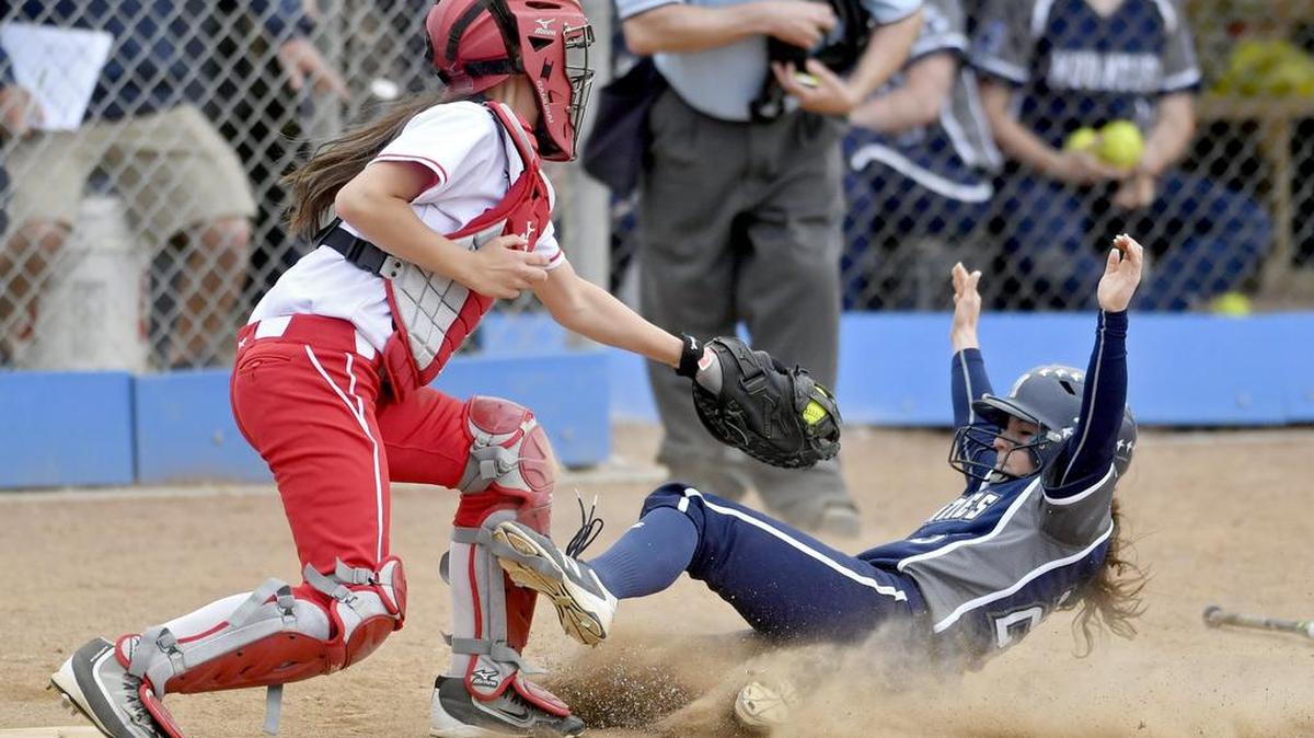 Bellefonte's Taylor Kerr tags out Philipsburg-Osceola's Kylie Thal on Wednesday. In the District 6 playoffs announced Friday, Bellefonte is the No. 1 seed in Class 4A and P-O is No. 2 in Class 3A.
