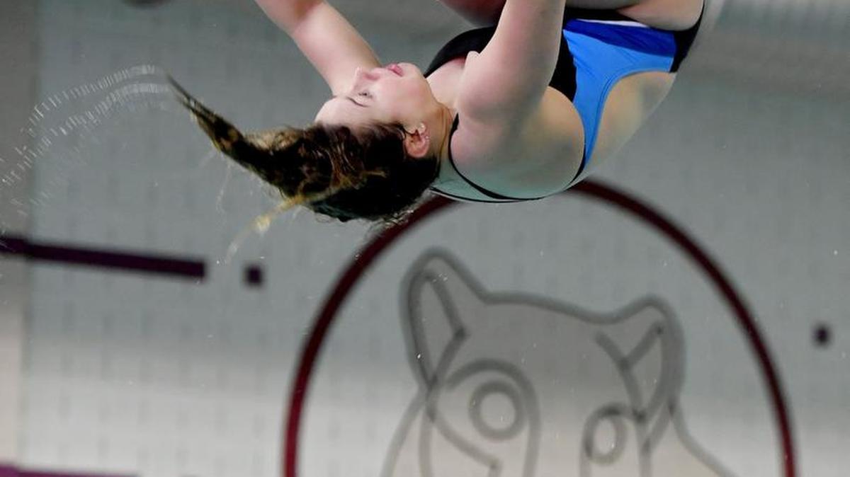 State College Area diver Tally Brown does a reverse dive pike during practice with her teammates on Thursday.