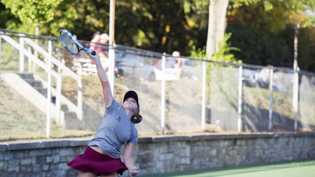 State College sophomore Kelly Vanden serves the ball during a match against Altoona on Monday, Oct 17, 2016 at State College Area High School.