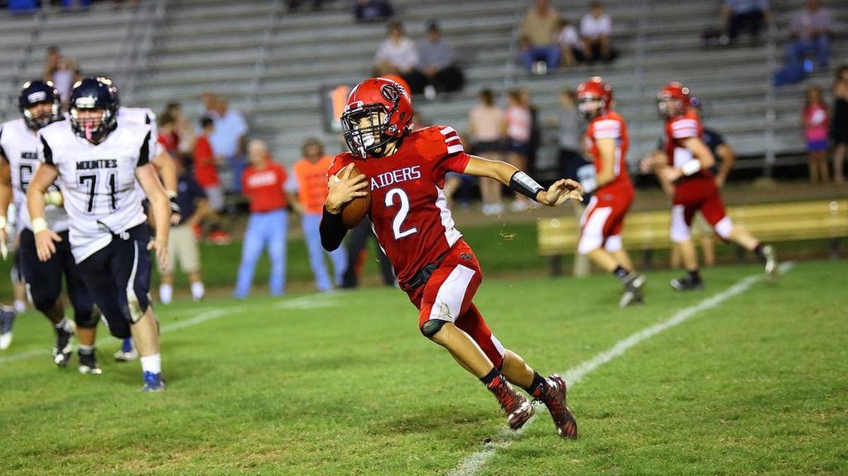 Bellefonte’s Jaiden Boone runs in the back field as the Bellefonte Red Raiders played the Philipsburg Osceola Mounties in Bellefonte on Friday night.