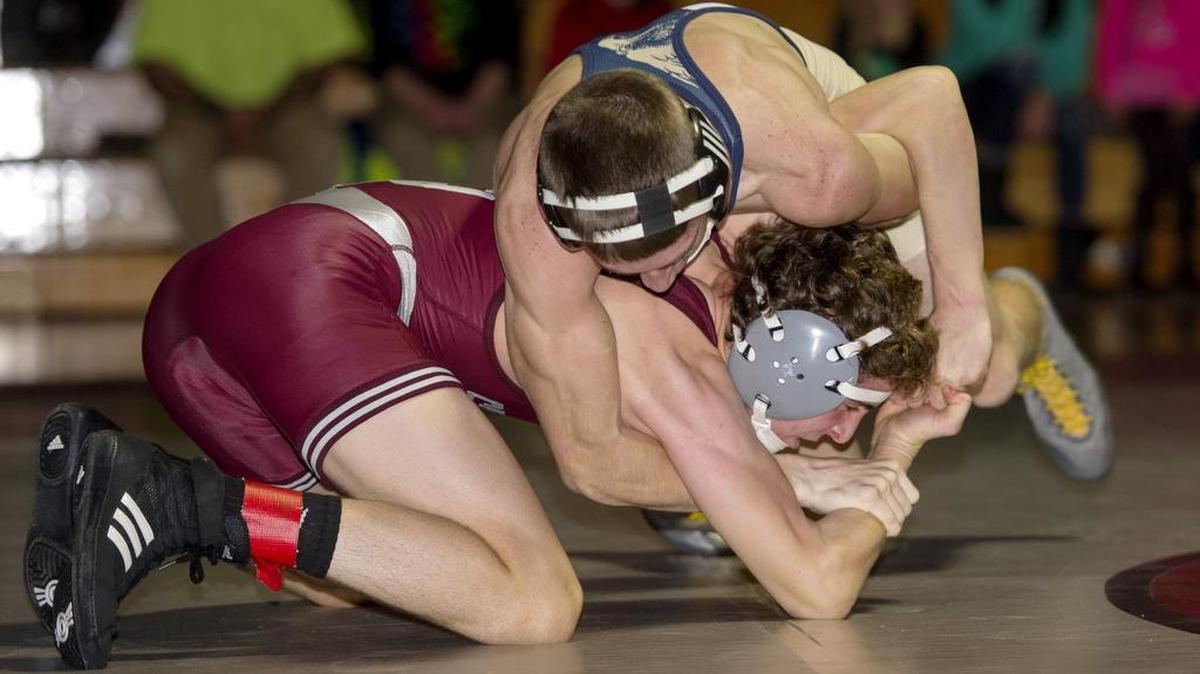 Bald Eagle Area’s Cobey Bainey controls State College’s Zachary Price in the 145-pound bout during the match on Thursday. Bainey won by decision, 8-4.
