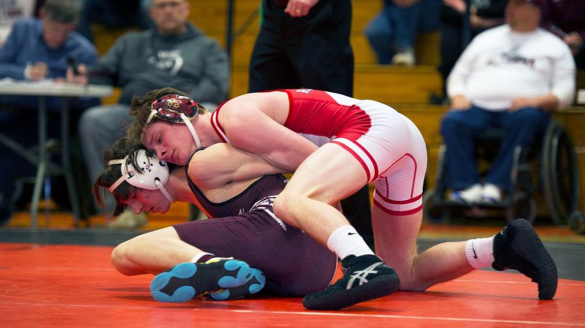 Bellefonte's Brock Port, right, wrestles Altoona's Stephen Smith during the District 6 Class AAA wrestling duals Saturday, Feb 4, 2017 at Tyrone Area High School.