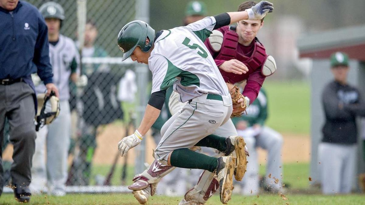 State College catcher Zach Ripka tags out Central Dauphin's Troy Schreffler during the Friday, April 29, 2016 game. Central Dauphin won, 3-2.