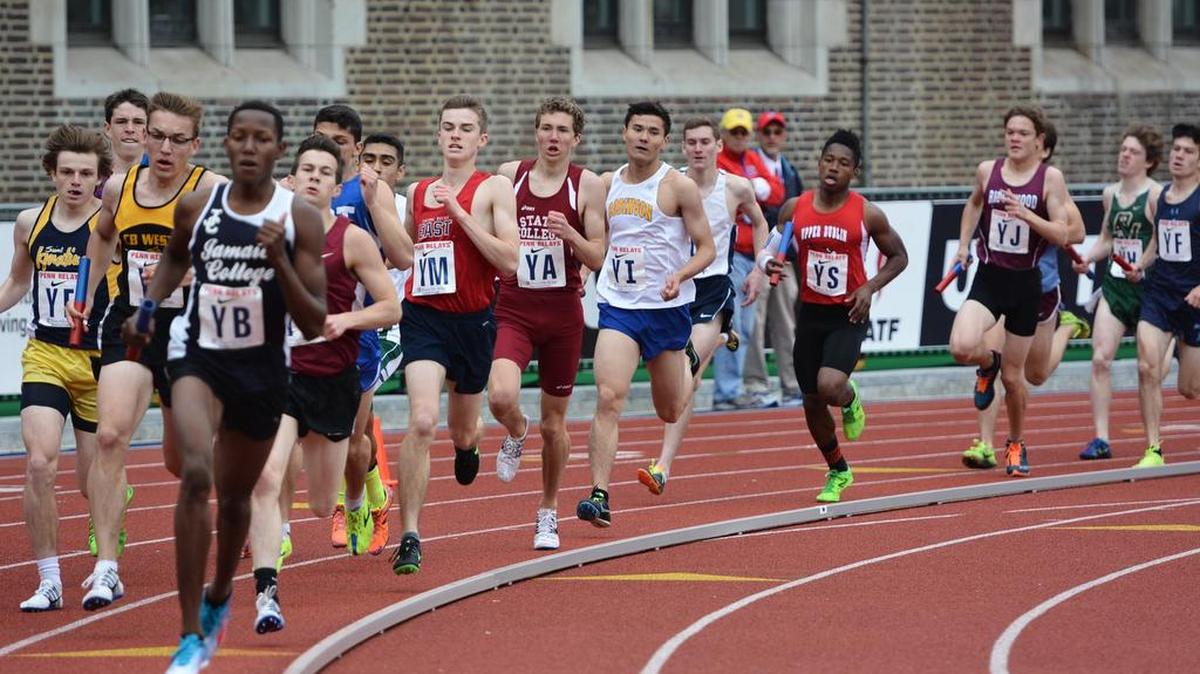 State College’s Owen Wing (YA) runs the lead leg in the 4x800-meter race at the Penn Relays in Philadelphia on Friday.