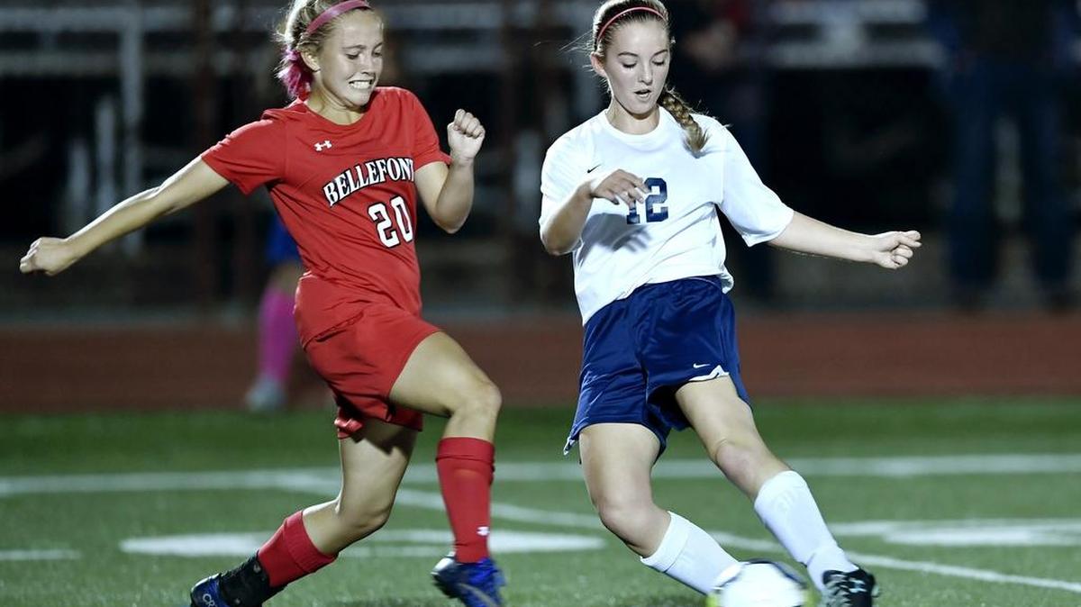 Bald Eagle Area's Addison Proctor kicks the all around Bellefonte's Hannah Robb during the Thursday, October 20, 2016 game. Bellefonte won, 2-1.