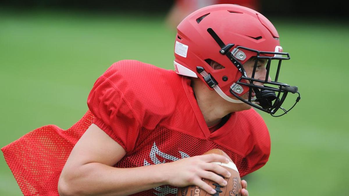 Nicholas Paloskey holds onto the ball as he runs a drill during Bellefonte’s football practice August 14 at Bellefonte Area High School.