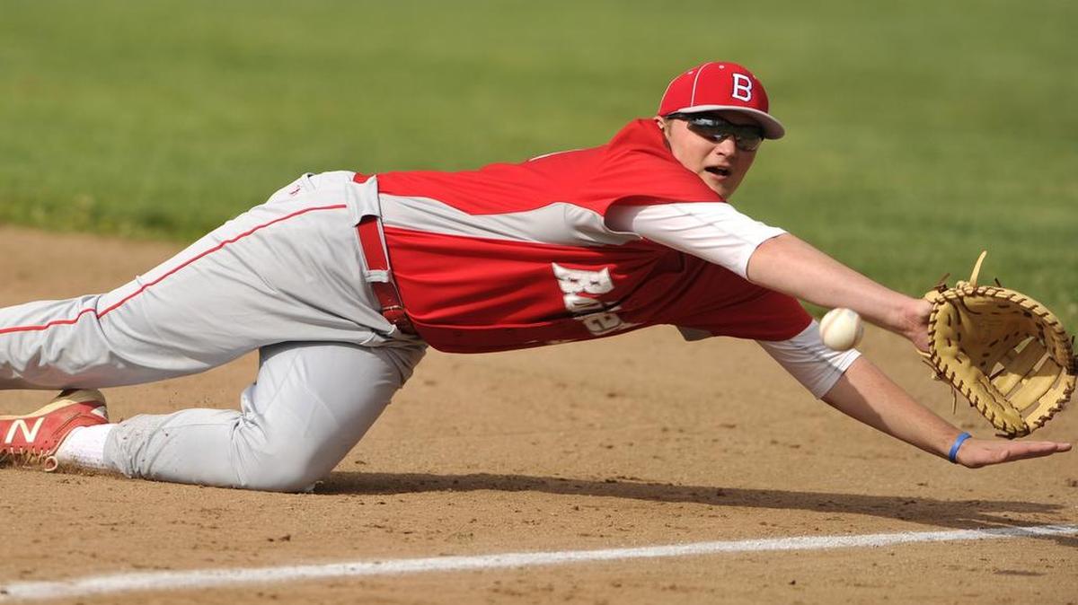 Bellefonte’s Logan Mathieu dives for a ball earlier this season. The Red Raiders meet Hollidaysburg in the District 6 championship game in Altoona on Wednesday.