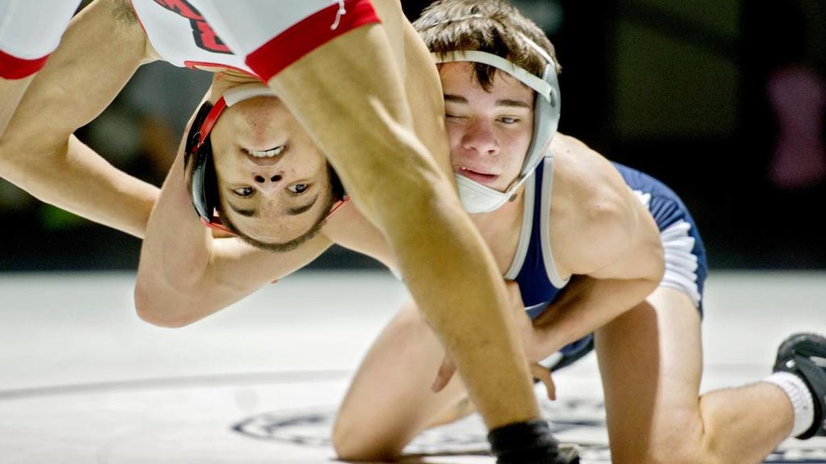 Bellefonte's Shafiq Blake and Penns Valley's Darren Yearick wrestle at 113 pounds on Feb. 11. Yearick earned a No. 1 seed for the District 6 Class AA tournament, which begins Friday in Altoona.