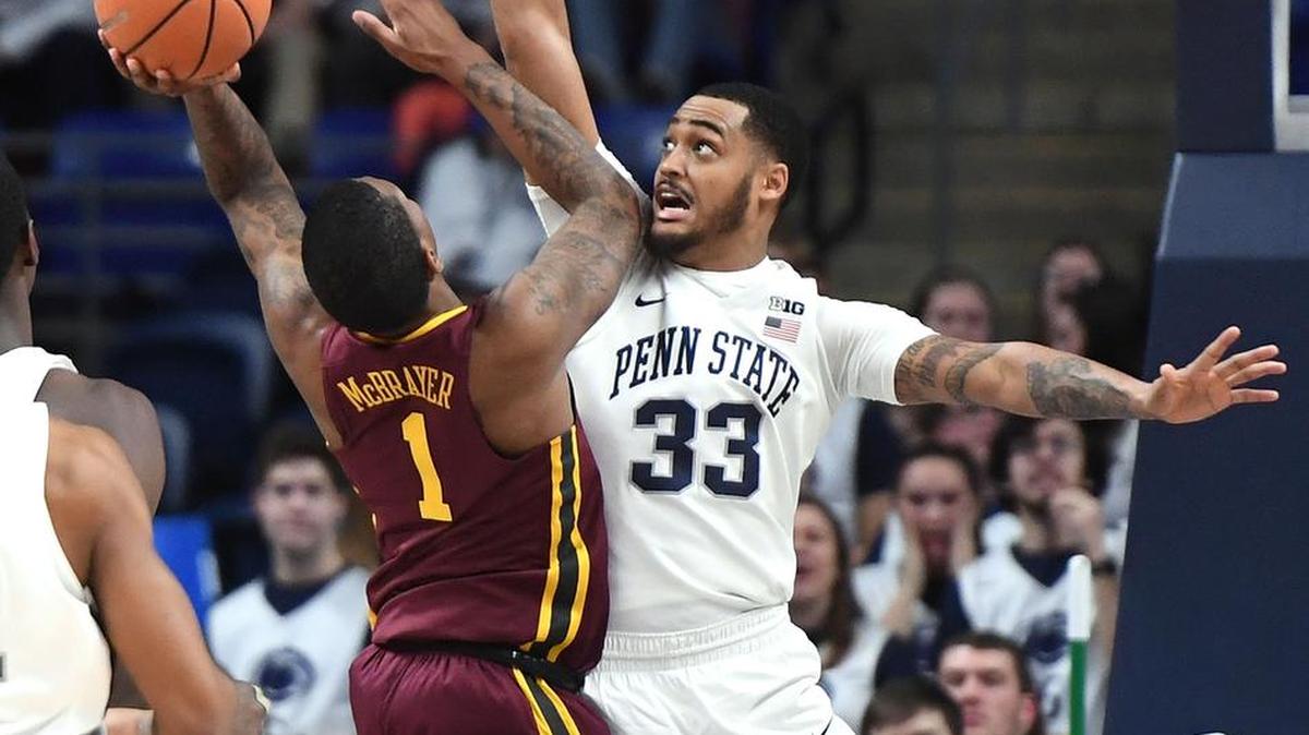 Penn State’s Shep Garnerdefends against Minnesota’s Deivis Zemgulis during Monday’s overtime game.