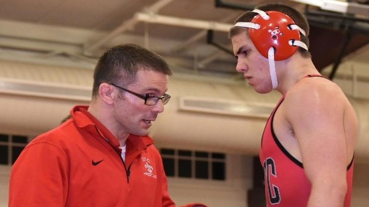 Former State College wrestler Rob Prebish, left, talks to his wrestler Loudon Hurt. Prebish is the assistant coach for the United States’ wrestling team for the Maccabiah Games.