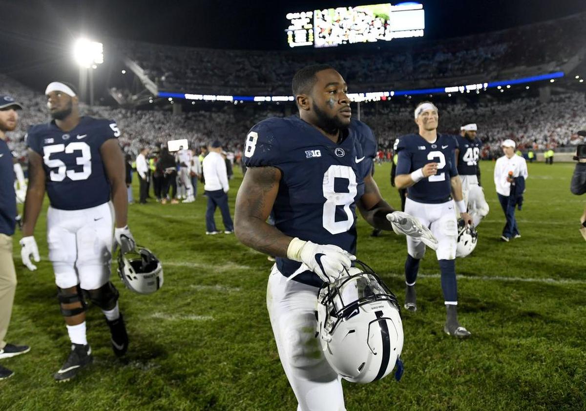 Penn State running back Miles Sanders walks off the field in disappointment after the loss to Ohio State on Saturday, Sept. 29, 2018 at Beaver Stadium.