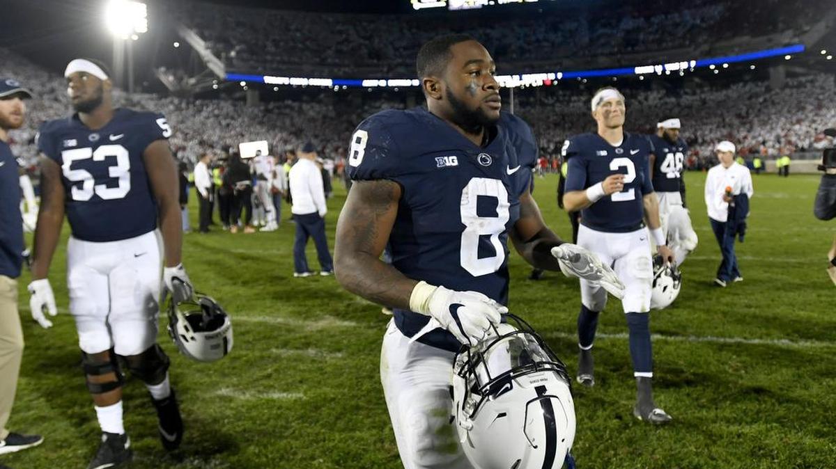 Penn State running back Miles Sanders walks off the field in disappointment after the loss to Ohio State on Saturday, Sept. 29, 2018 at Beaver Stadium.