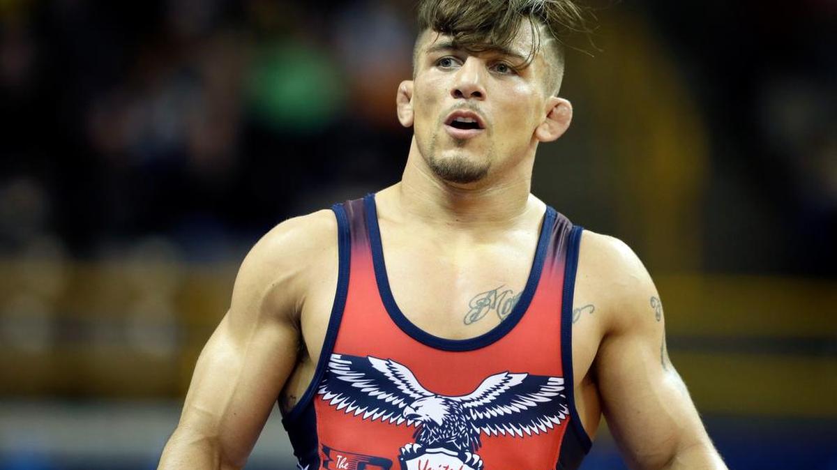 Frank Molinaro looks on before wrestling Logan Stieber in their 65-kilogram freestyle match at the U.S. Olympic Wrestling Team Trials, Saturday, April 9, 2016, in Iowa City, Iowa.