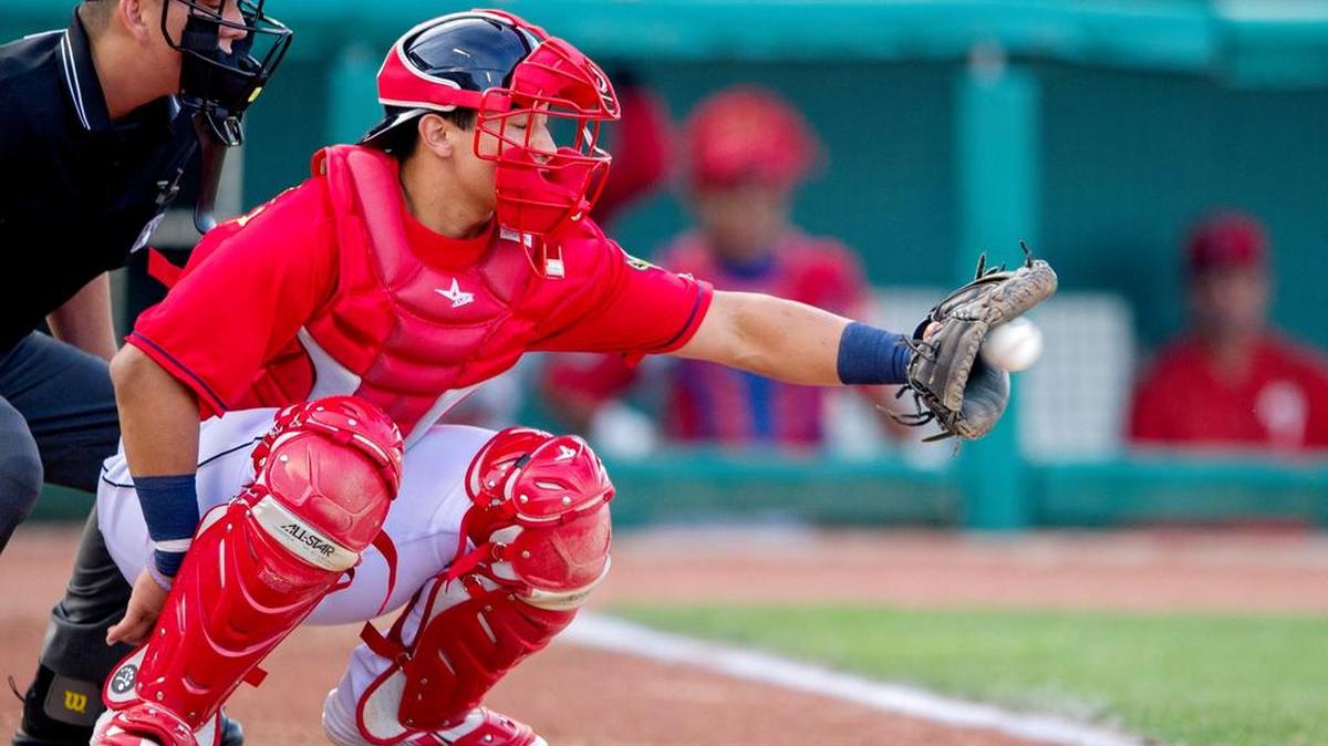 State College's Jeremy Martinez catches a pitch from Carson Cross during the season home opener against the Williamsport Crosscutters at Medlar Field on Saturday, June 18, 2016.