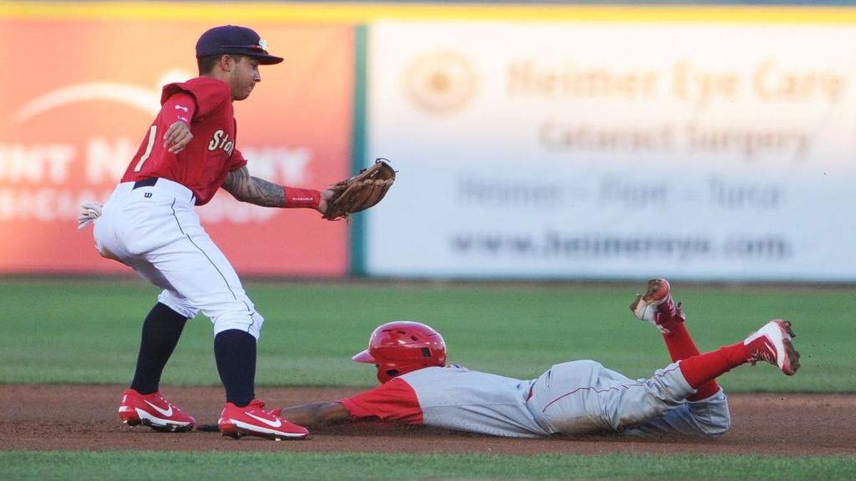 Spikes's shortstop Edwin Figuera tags out Williamsport's Jonathan Guzman during opening night Monday, June, 19, 2017 at Medlar Field.