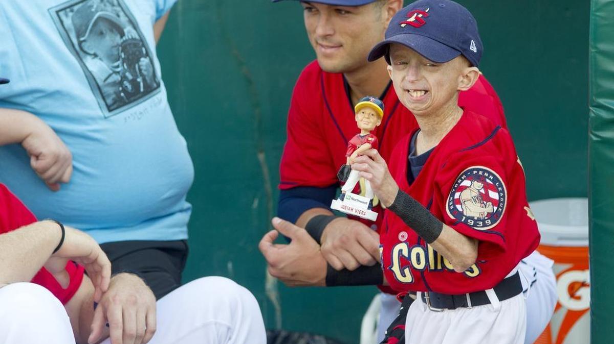 Josiah Viera holds up the bobble head that was made to honor him and was the giveaway for the Saturday, July 9, 2016 game.
