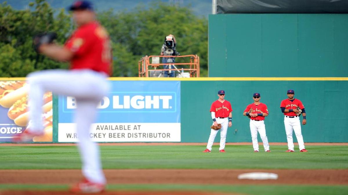 Spikes outfielders watch as Alex Fagalde warms up during a game earlier this month. On Wednesday, Fagalde was solid in relief of Andrew Summerville — as he allowed no hits over 2 1/3 innings to earn the pitching win.