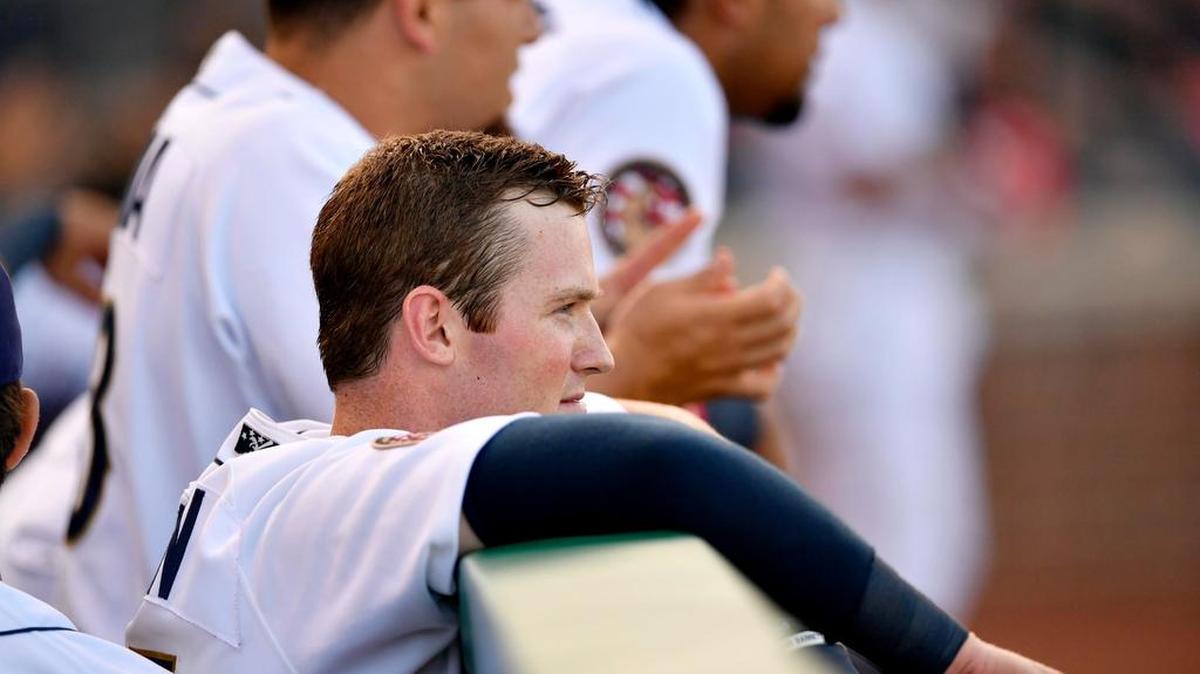 State College Spikes' Brandon Benson watches his teammates at bat during the game against Auburn on Friday, July 7, 2017.