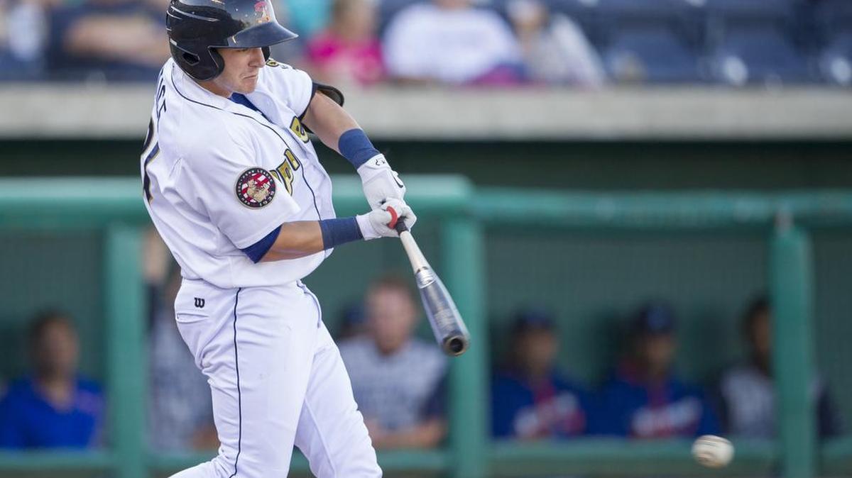 The State College Spikes’ Dylan Tice hits a single during Thursday’s game against Brooklyn. Tice is in his second season of professional baseball.
