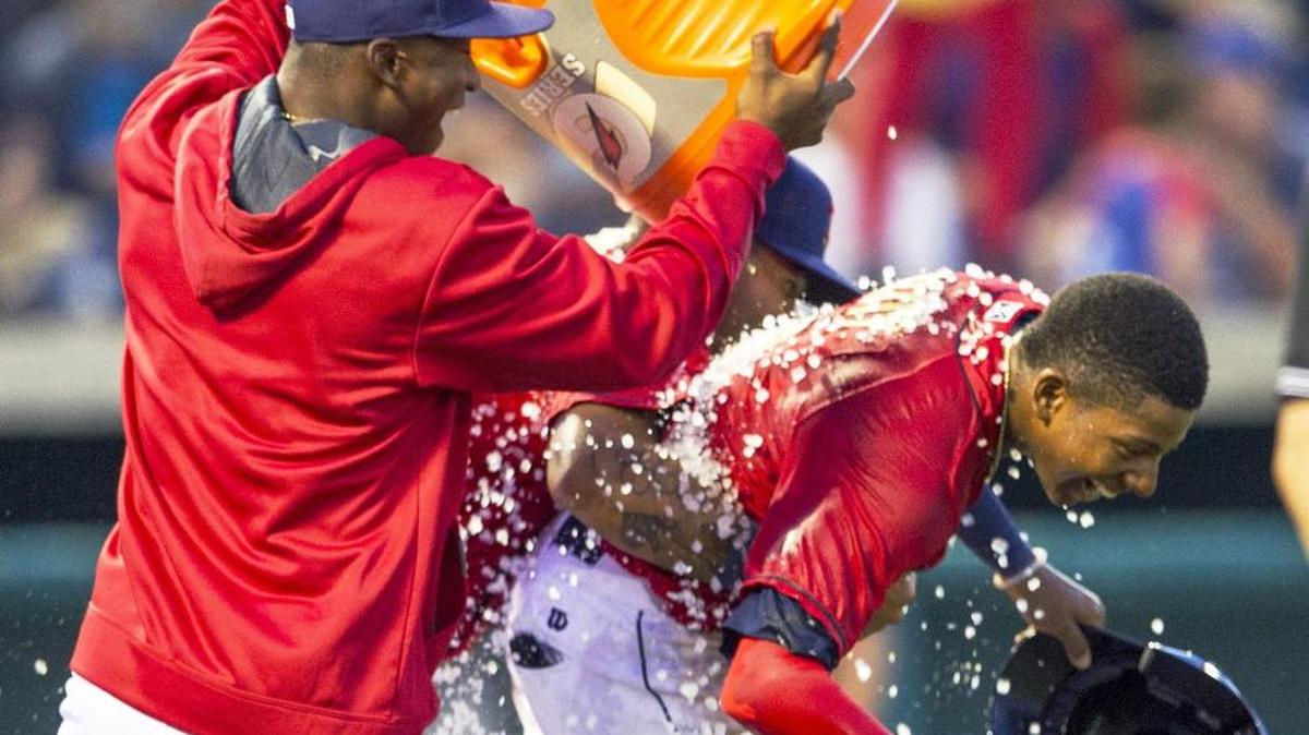 State College Spikes center fielder Anthony Ray is doused in ice water by teammates after scoring the the game-winning run against the Hudson Valley Renegades at Medlar Field at Lubrano Park on Sunday.