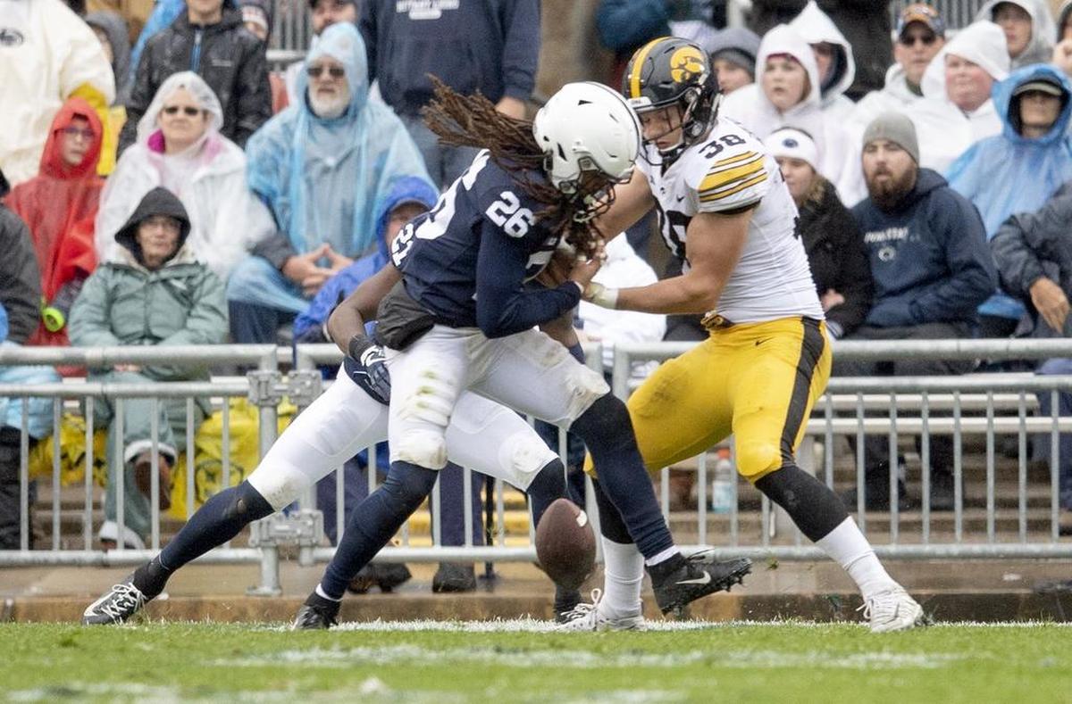 Penn State safety Jonathan Sutherland knocks the ball away from Iowa tight end T.J. Hockenson during the game on Saturday, Oct. 27, 2018.
