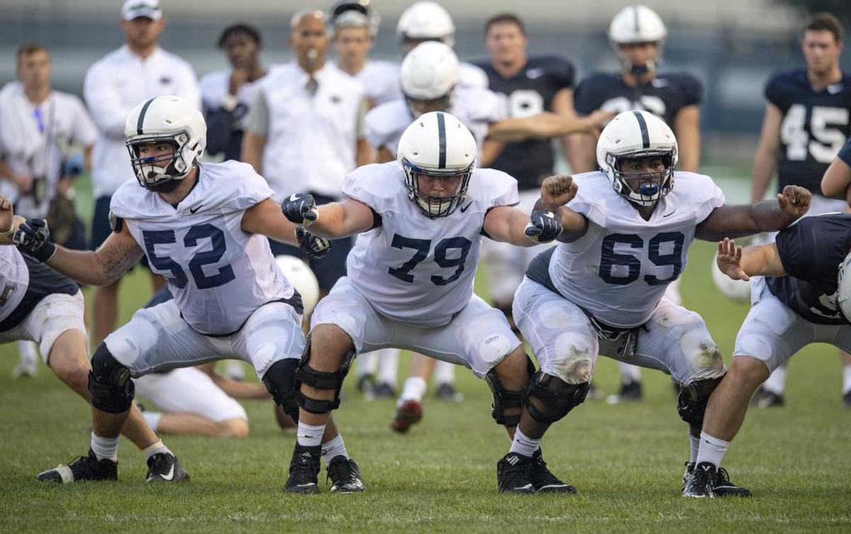 Penn State offensive lineman Ryan Bates, Charlie Shuman and C.J. Thorpe block for a field goal during practice on Wednesday, August 8, 2018.