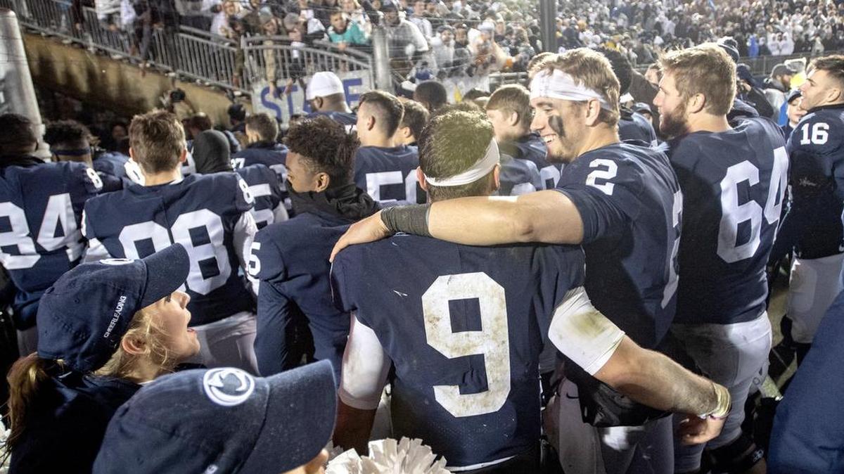 Penn State quarterbacks Trace McSorley and Tommy Stevens walk off the field together celebrating the win over Iowa on Saturday, Oct. 27, 2018.
