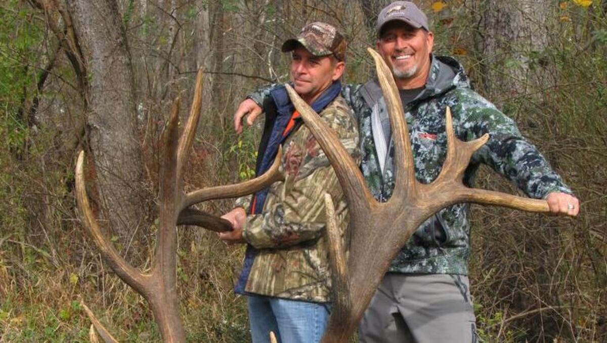 Ron Marney (right) and his brother Dave with an elk that could be the new Pennsylvania record.