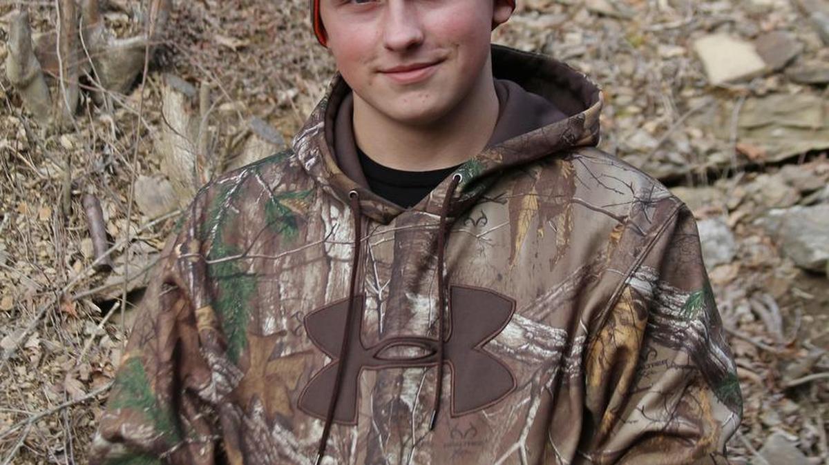 Fifteen year-old Seth Bumbarger won a record $16,592 at the Mosquito Creek Sportsmen Coyote Hunt with his 46.5-pound coyote.