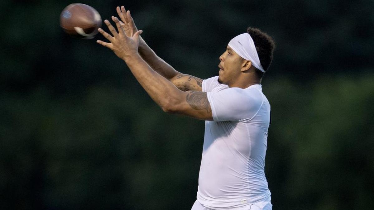 Penn State tight end Jonathan Holland makes a catch after practice on Wednesday, August 8, 2018.  