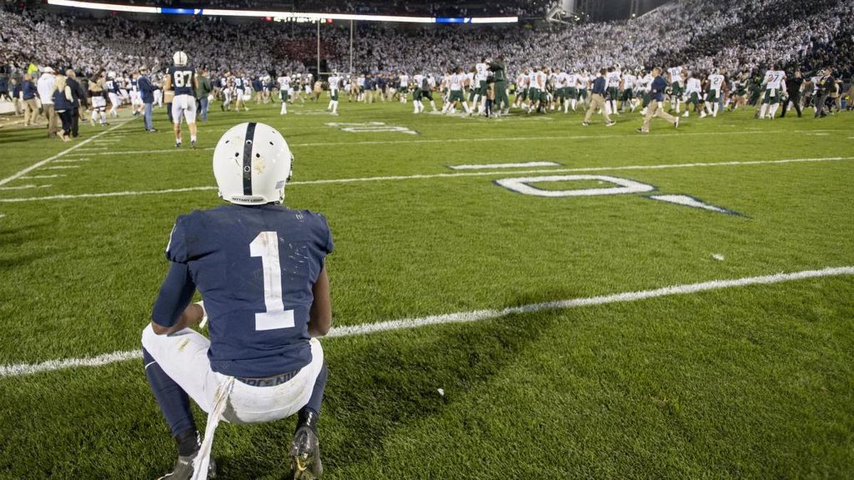 Penn State wide receiver KJ Hamler watches in disappointment as Michigan State celebrates their 21-17 win on Saturday, Oct. 13, 2018.