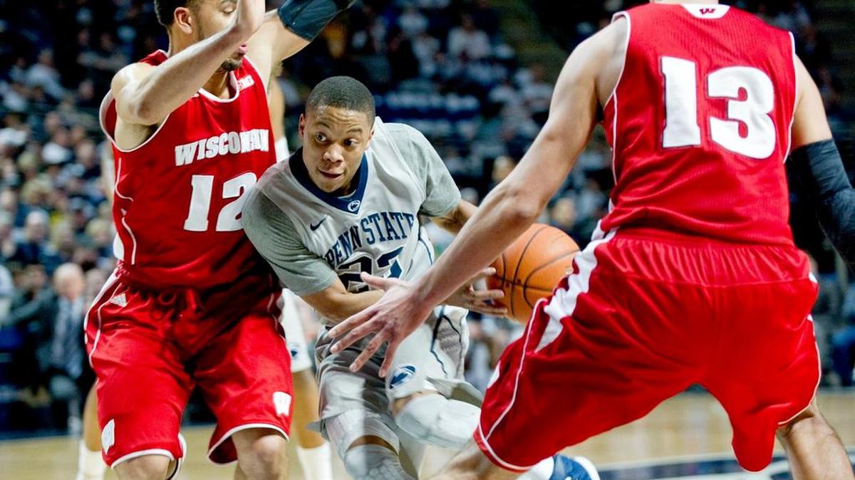 Penn State's Tim Frazier dribbles between Wisconsin's Traevon Jackson and Duje Dukan during the Sunday, March 2, 2014 game at the Bryce Jordan Center. The badgers won, 71-66.