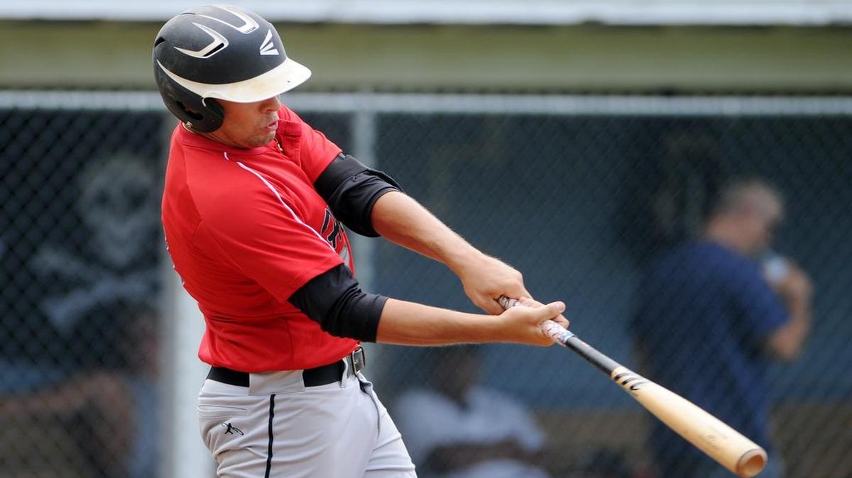 Howard’s Hunter Eminhizer, seen here in a game earlier this series, will help host Spike Island in Game 4 of a five-game playoff series at 2 p.m. Sunday. The Howard Hawks will be eliminated with a loss.