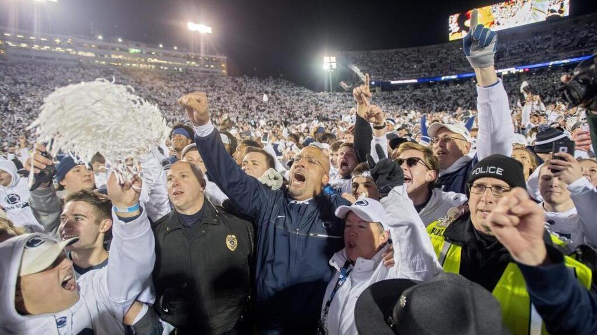 Penn State football coach James Franklin celebrates with the Penn State crowd after the 24-21 win over Ohio State on Saturday, October 22, 2016 game at Beaver Stadium.