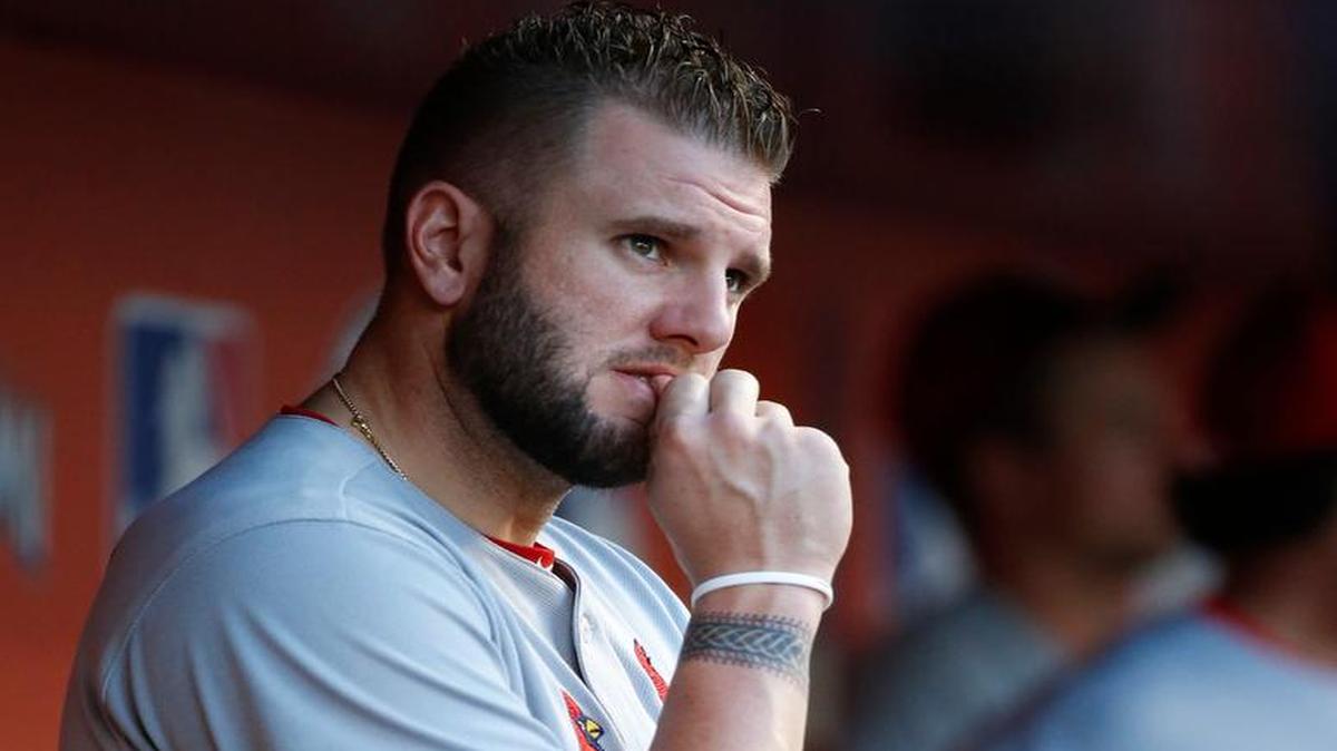 St. Louis Cardinals’ Matt Adams looks out of the dugout before the start of a baseball game against the Miami Marlins, Monday, May 8, 2017, in Miami.