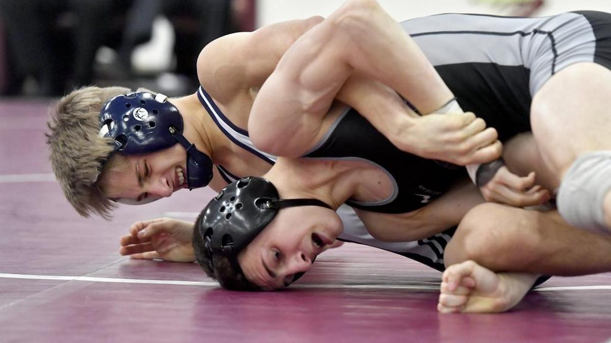 Philipsburg-Osceola's Hunter Weitoish controls Mifflin County's Joey Taptich in a 126 lb semifinal bout during the district 6 AAA wrestling championships at Altoona on Saturday, February 24, 2018. Weitoish won by decision, 4-0.